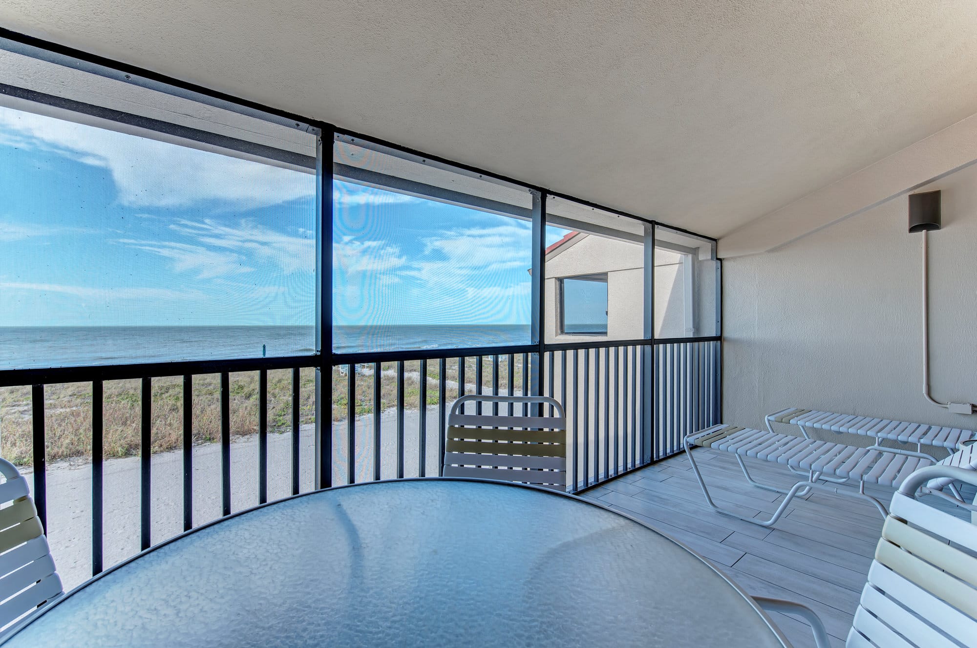 Casa Del Mar rental balcony with seating and beach view