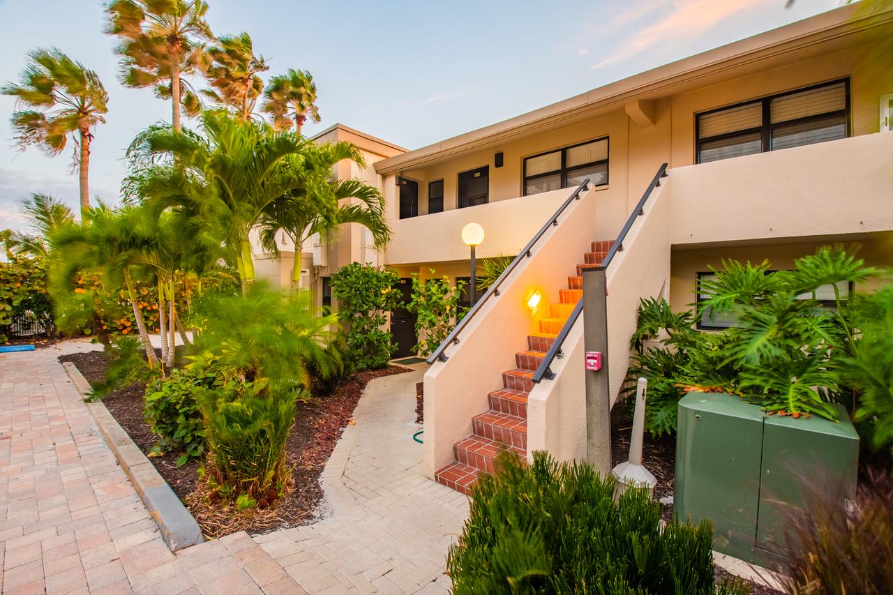 Landscaped walkway beside Casa Del Mar beachfront rental buildings