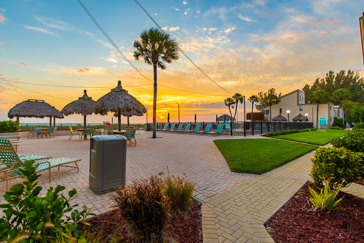 Casa Del Mar resort patio and pool area at sunset on Longboat Key