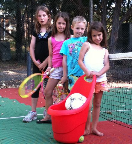 Kids playing tennis during a Casa Del Mar stay