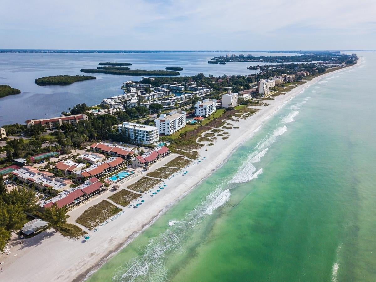 Aerial view along the white-sand shoreline of Longboat Key