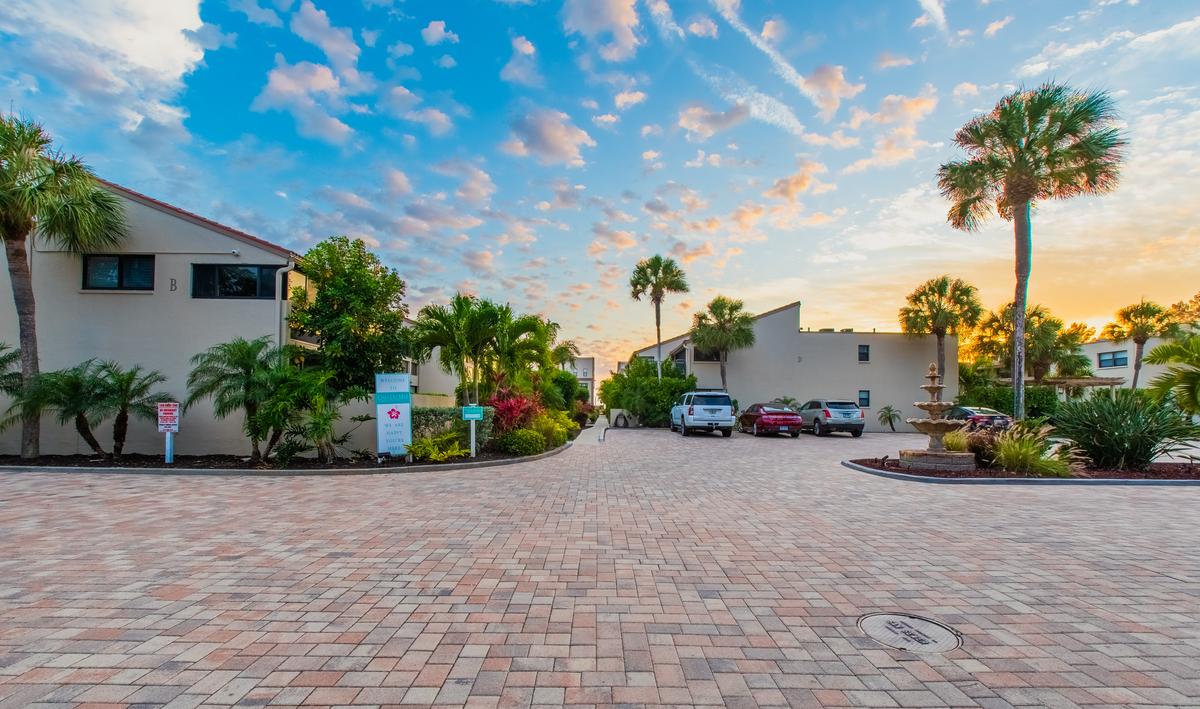 Sunset sky above the palm-lined drive through Casa Del Mar