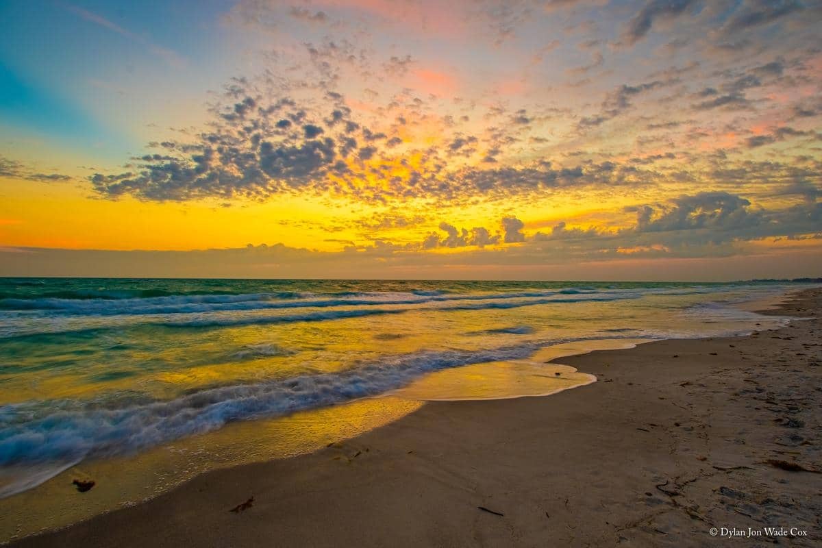 White sandy Longboat Key beach and Gulf sunset near Casa Del Mar
